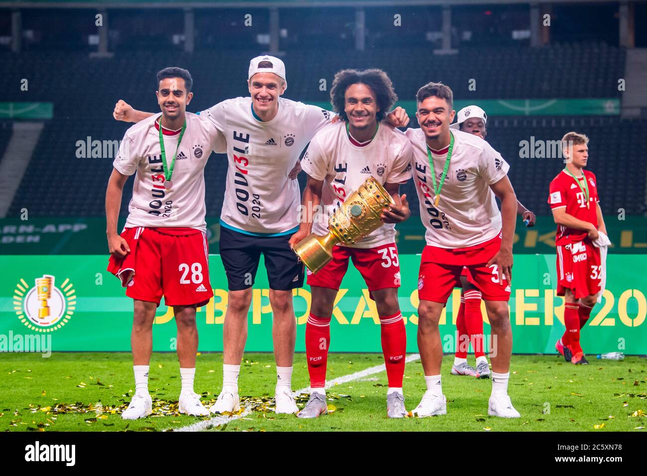 Berlin, Germany, 4 th July 2020,  Oliver BATISTA MEIER, FCB 34 fChristian FRÜCHTL, FCB 36 35 Sarpreet SINGH , FCB 28. with trophy at the DFB Pokal Final match  FC BAYERN MUENCHEN - BAYER 04 LEVERKUSEN 4-2  in season 2019/2020 , FCB Foto: © Peter Schatz / Alamy Live News / Kevin Voigt/Jan Huebner/Pool   - DFB REGULATIONS PROHIBIT ANY USE OF PHOTOGRAPHS as IMAGE SEQUENCES and/or QUASI-VIDEO -  National and international News-Agencies OUT Editorial Use ONLY Stock Photo