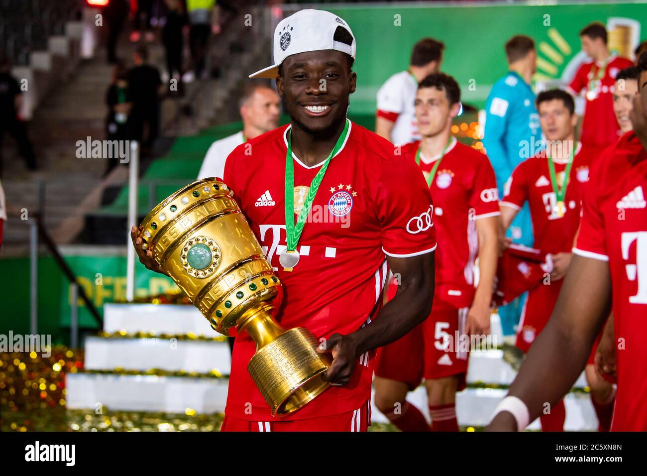 Berlin, Germany, 4 th July 2020, winner ceremony: Alphonso DAVIES, FCB 19  with trophy at the DFB Pokal Final match FC BAYERN MUENCHEN - BAYER 04  LEVERKUSEN 4-2 in season 2019/2020 ,
