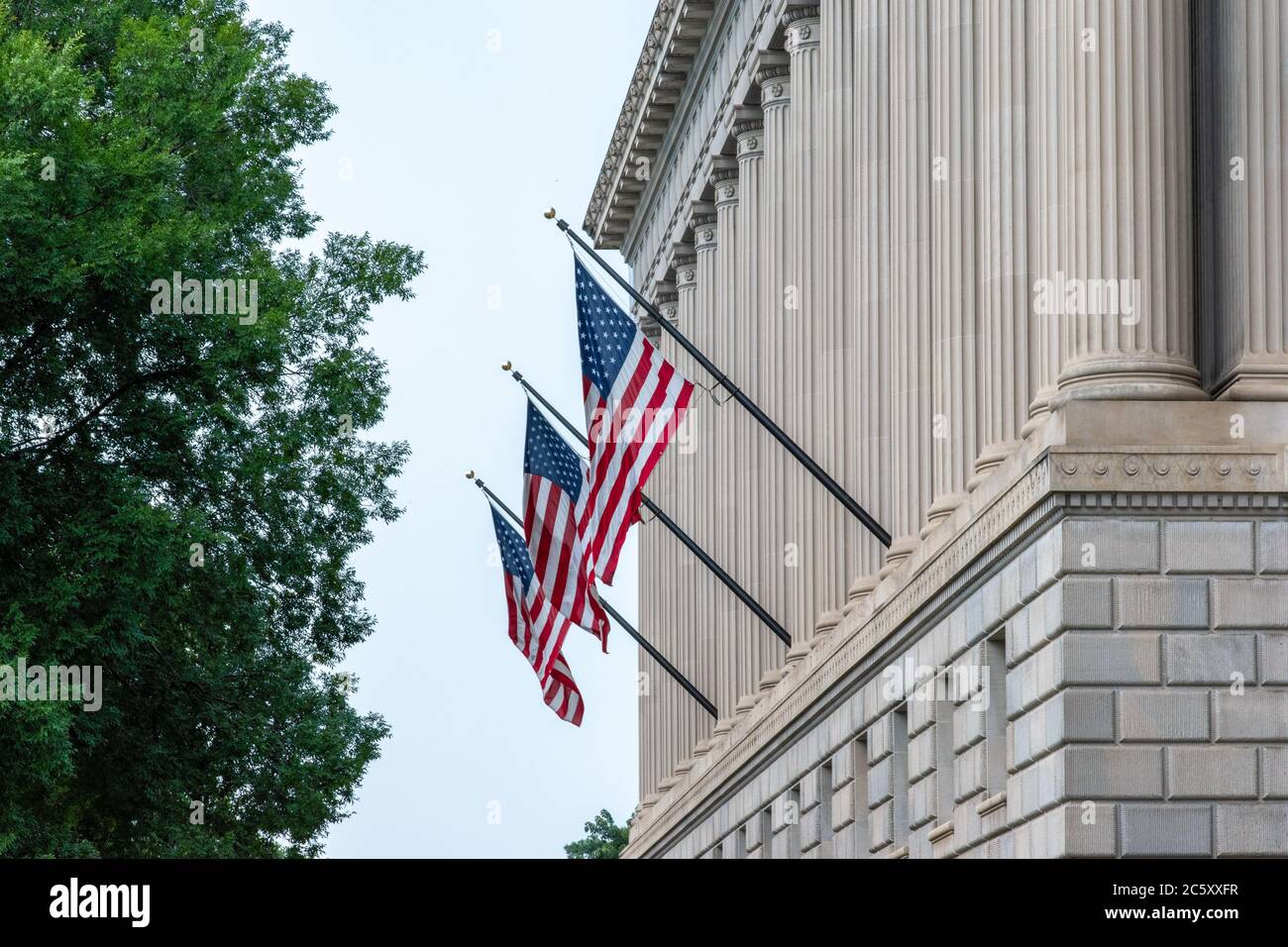 American Flags adorn the entrance of the Bureau of Industry and Security ( BIS), an agency of the United States Department of Commerce Stock Photo -  Alamy