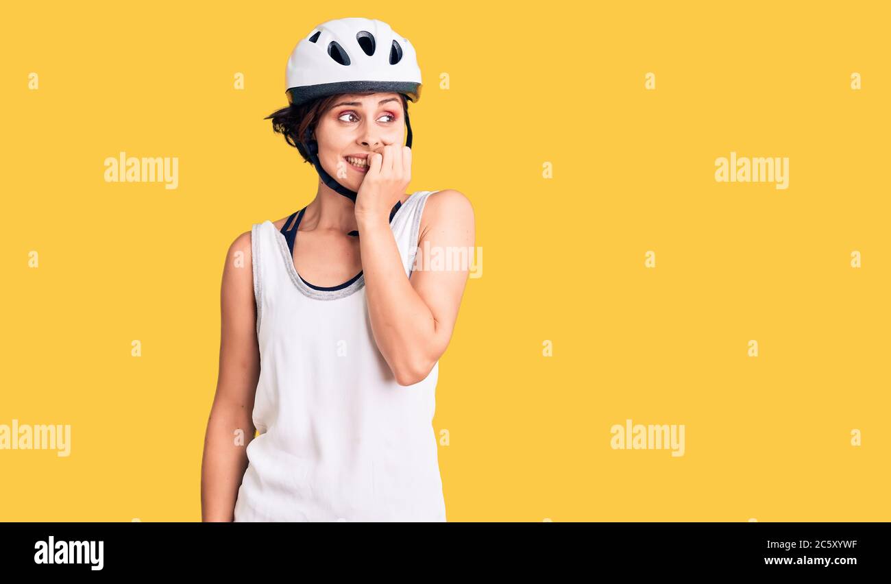 Woman wearing helmet stress hi-res stock photography and images - Alamy