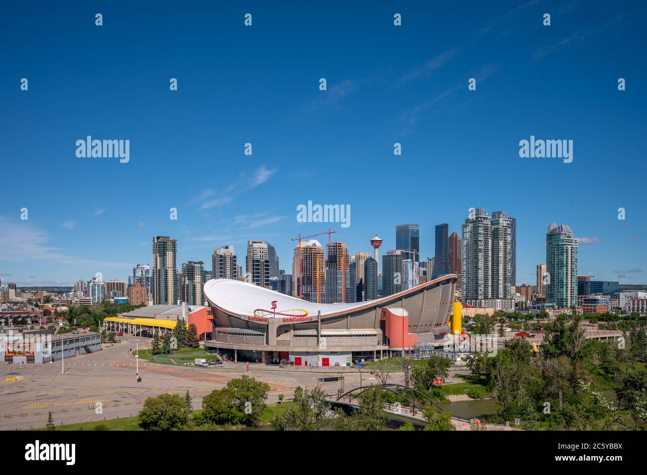 Calgary, Alberta - July 5, 2020: Calgary's Scotiabank Saddledome and the downtown skyline. The Saddledome is scheduled to be replaced in the near futu Stock Photo