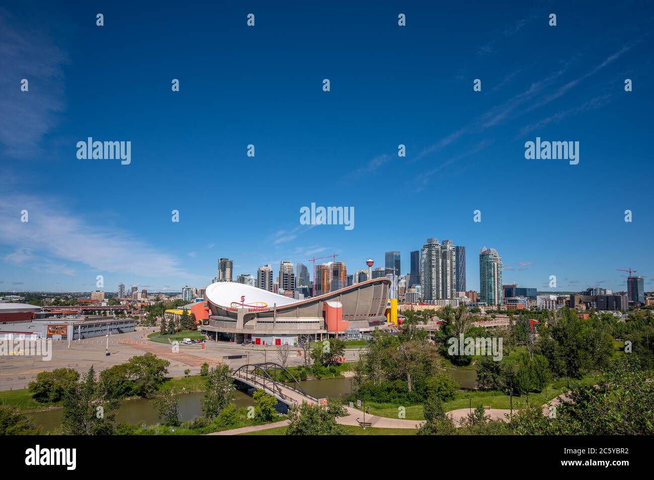 Calgary, Alberta - July 5, 2020: Calgary's Scotiabank Saddledome and the downtown skyline. The Saddledome is scheduled to be replaced in the near futu Stock Photo