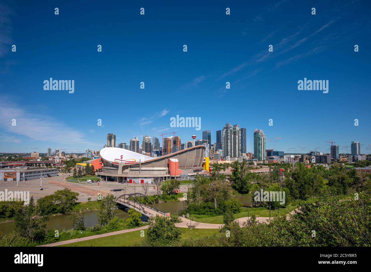 Calgary, Alberta - July 5, 2020: Calgary's Scotiabank Saddledome and the downtown skyline. The Saddledome is scheduled to be replaced in the near futu Stock Photo