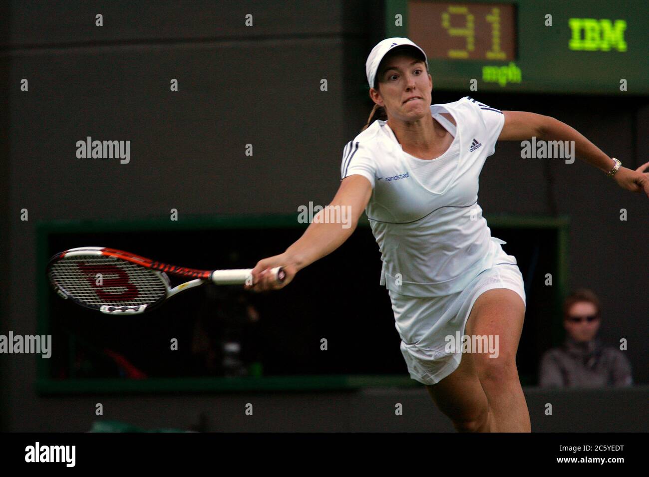 Justine Henin in action during her second round at match at Wimbledon in 2007. Stock Photo
