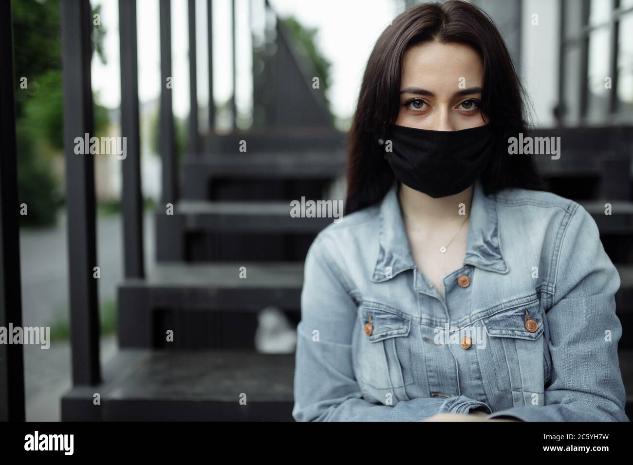 Woman wearing mask looking plants hi-res stock photography and images ...