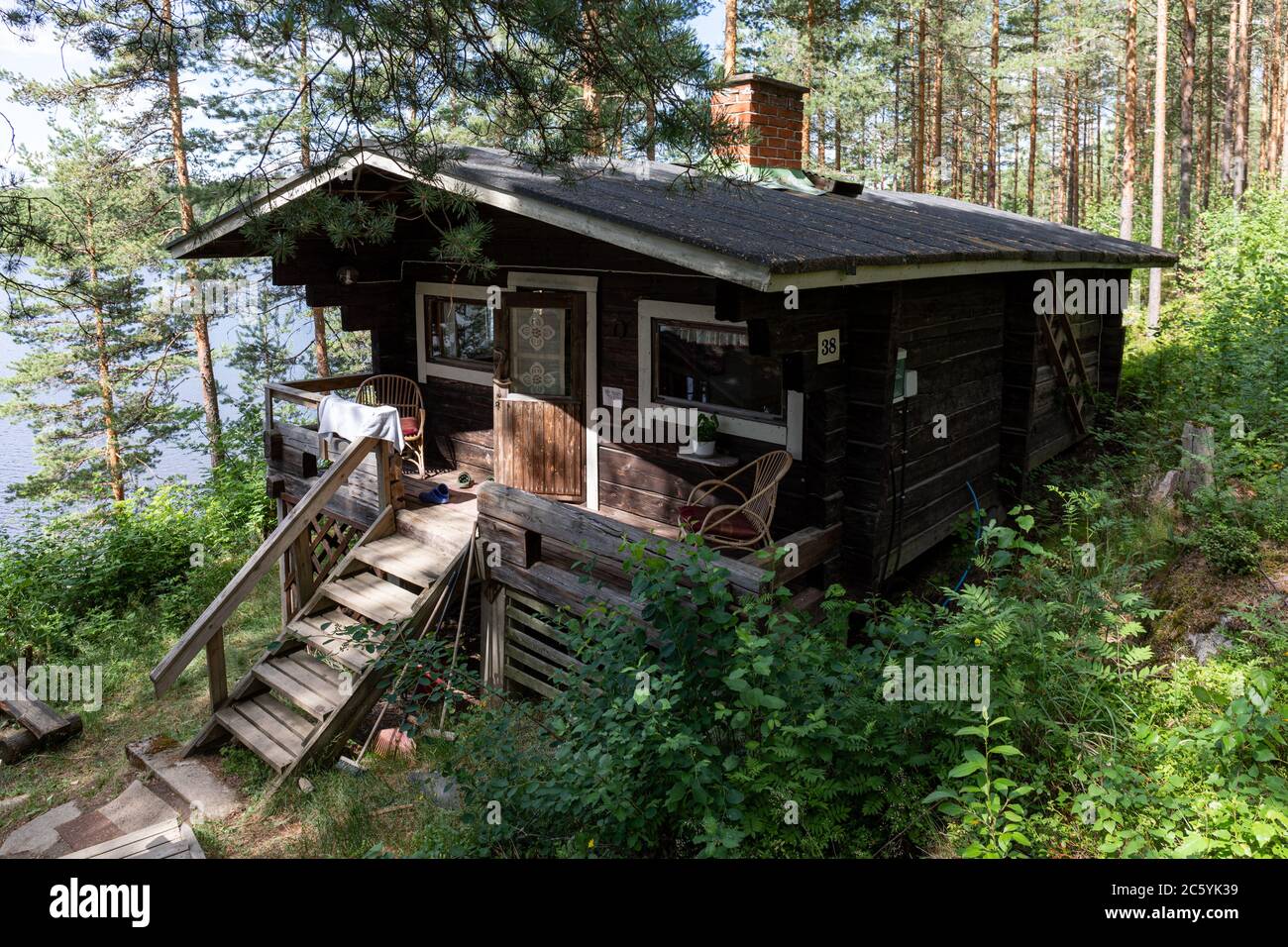 Typical Finnish summer cottage or log cabin from early 70's Stock Photo