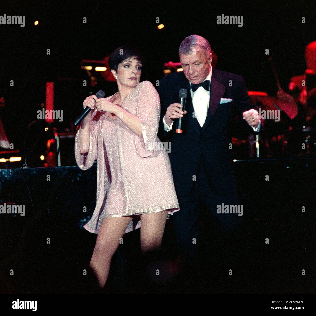 ARCHIVE: PALM SPRINGS, CA:  c.1991: Frank Sinatra & Liza Minnelli perform at the Frank Sinatra pro-celebrity golf tournament. File photo © Paul Smith/Featureflash Stock Photo