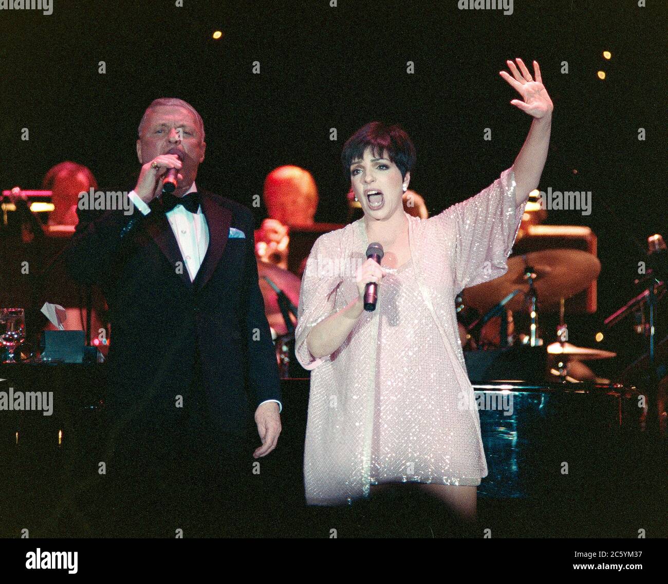 ARCHIVE: PALM SPRINGS, CA:  c.1991: Frank Sinatra & Liza Minnelli perform at the Frank Sinatra pro-celebrity golf tournament. File photo © Paul Smith/Featureflash Stock Photo