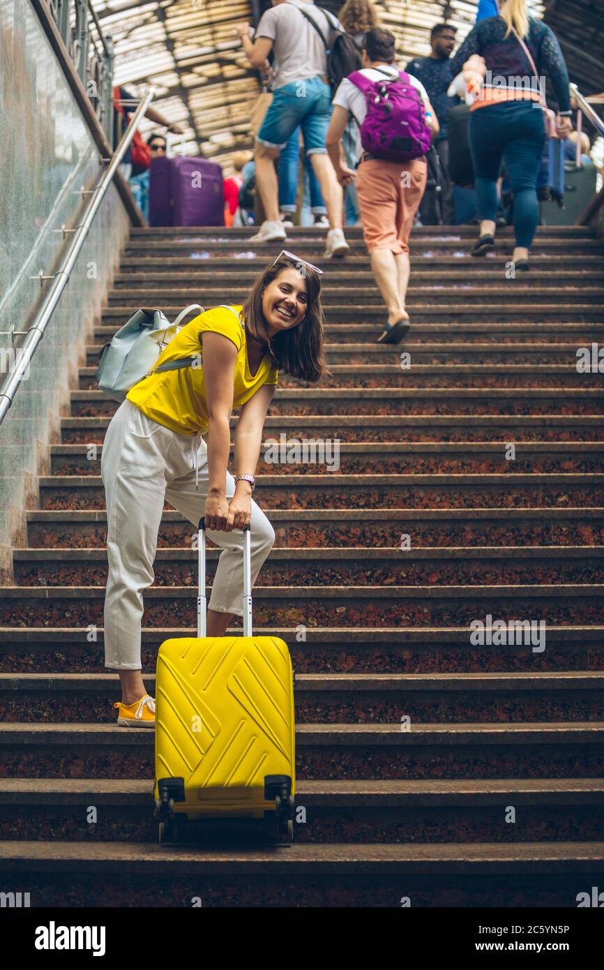 Pulling suitcase up stairs hires stock photography and images Alamy