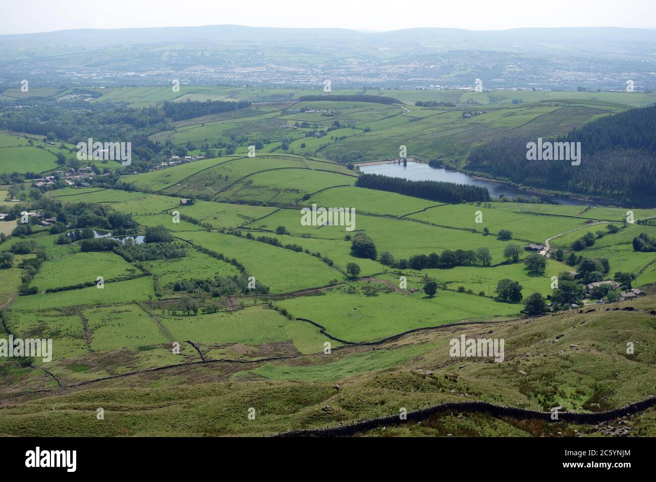 Lower Ogden Reservoir & the Village of Barley from near the Summit of Pendle Hill, Lancashire, England, UK. Stock Photo