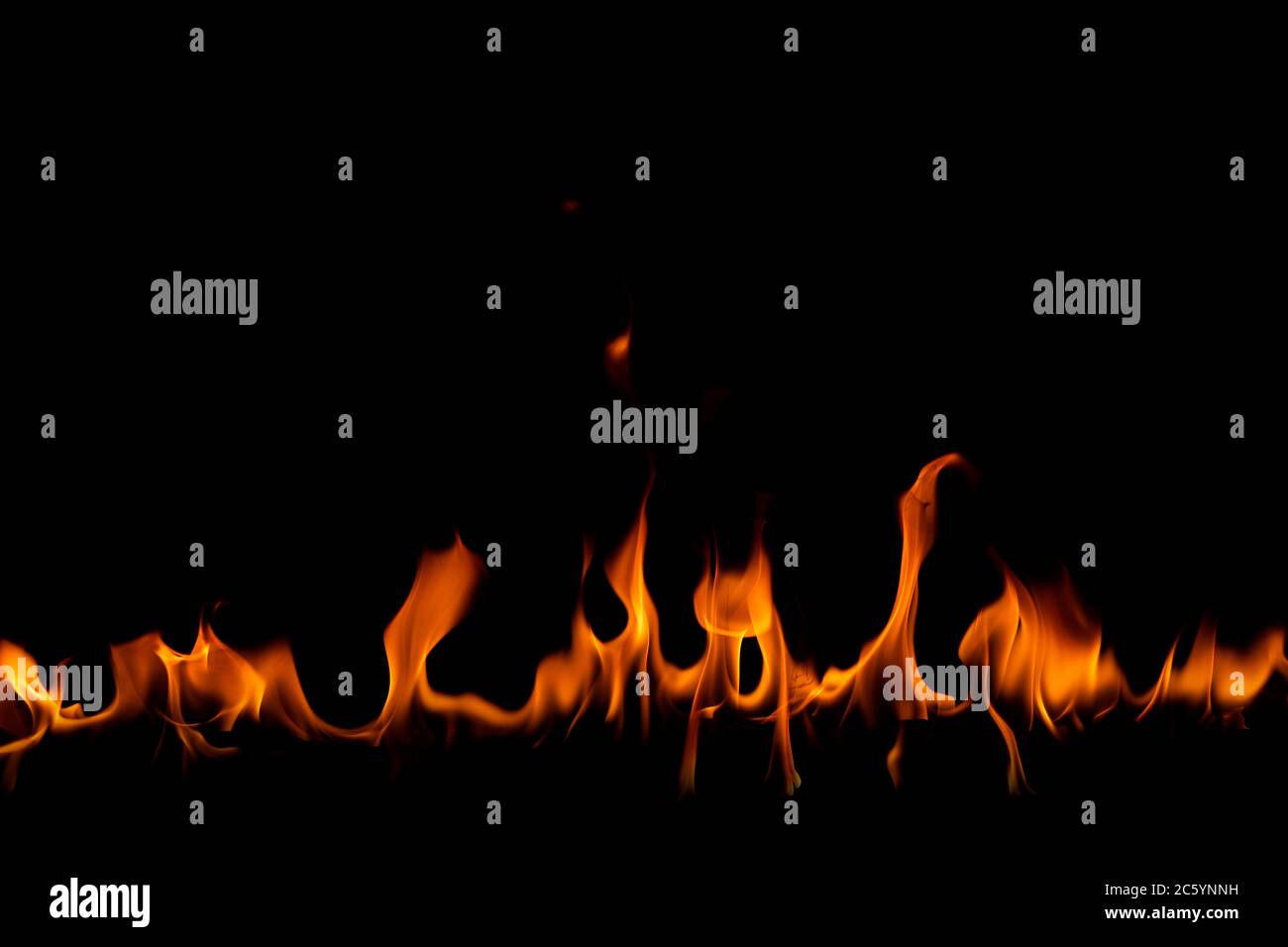 Fire flames on the black background Stock Photo