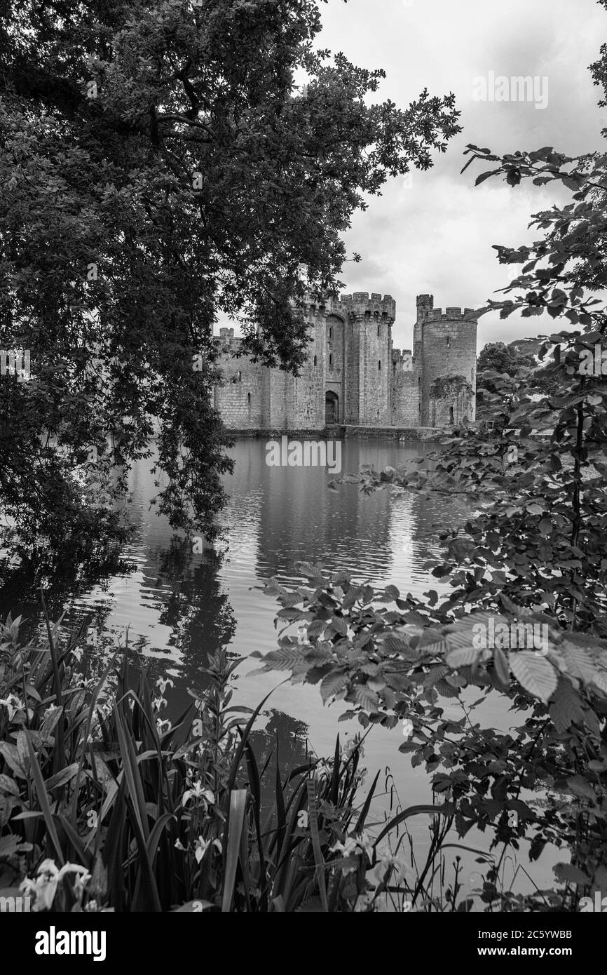 Bodiam Castle, East Sussex, England, UK: romantic 14th century moated castle ruins.  Black and white version Stock Photo