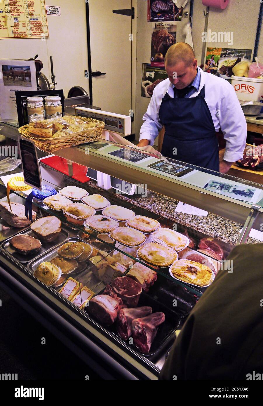 A bake shop selling meat pies and breads in Bakewell, England UK. Stock Photo