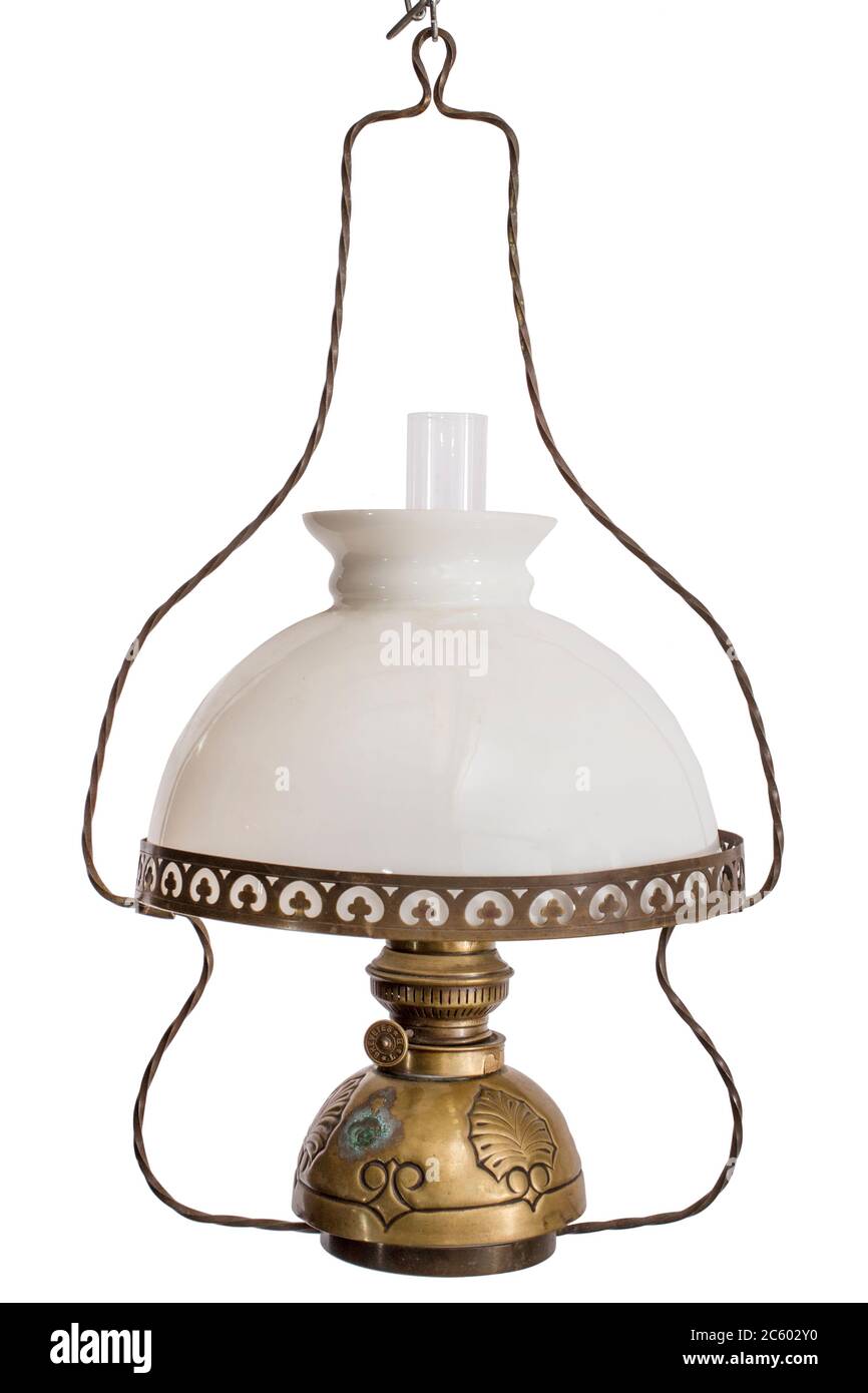 European antique oil lamp with lampshade on the white background Stock Photo