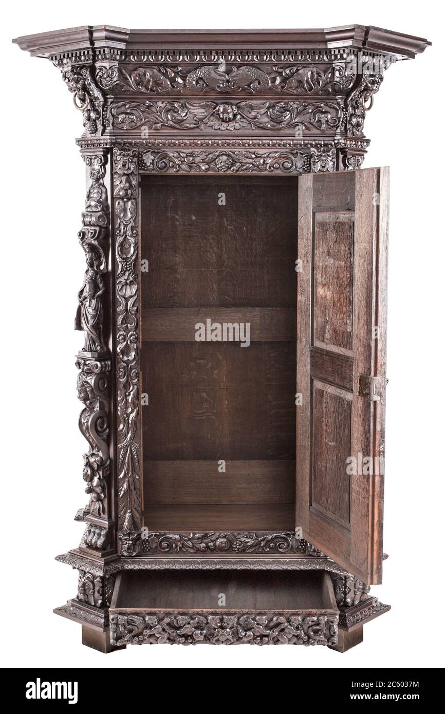Old original European antique wooden carved wardrobe buffet cabinet Stock Photo