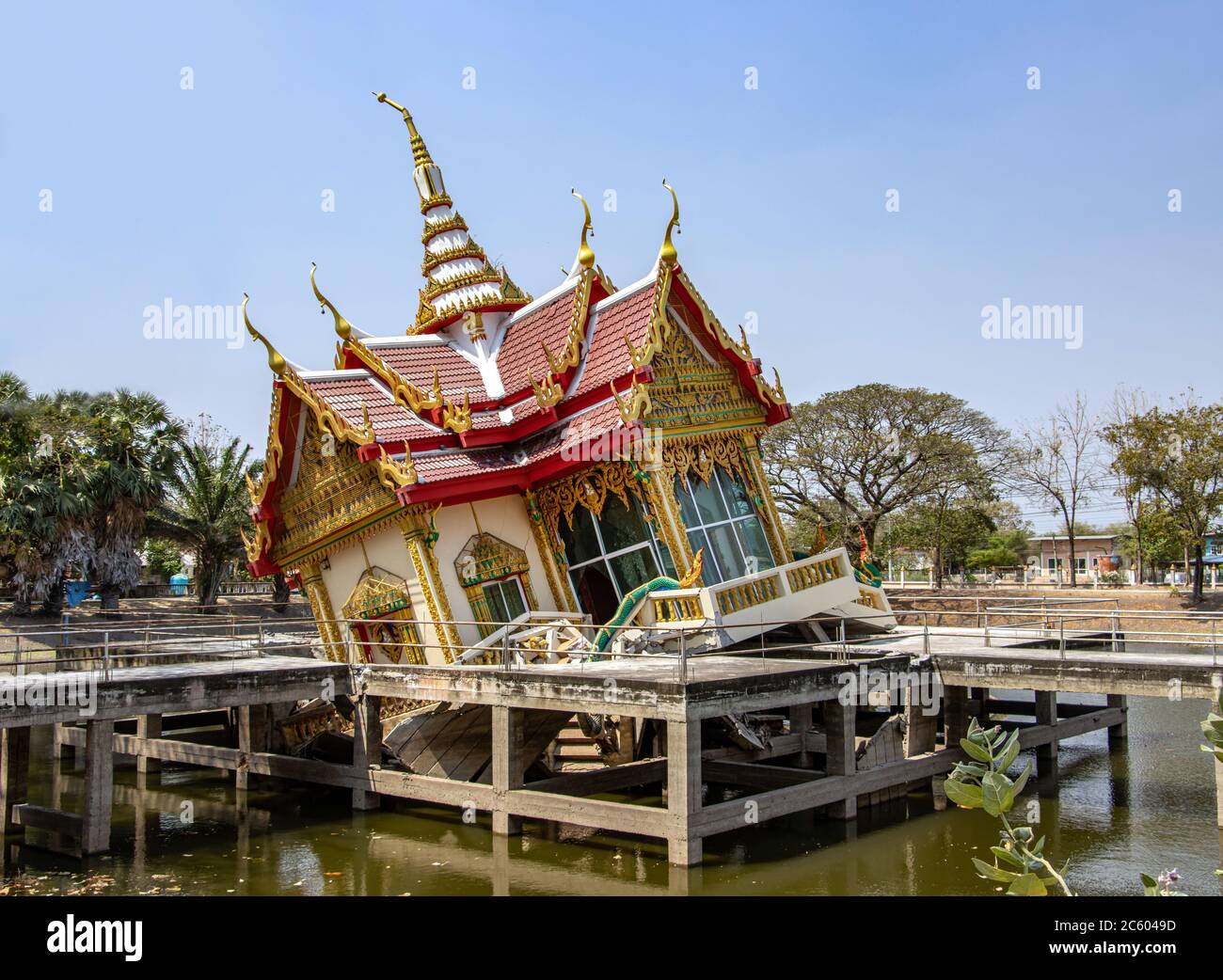 Buddhist temple Wat Khao Saphan Park fall down inside a concrete construction in water tank, Thailand. Stock Photo