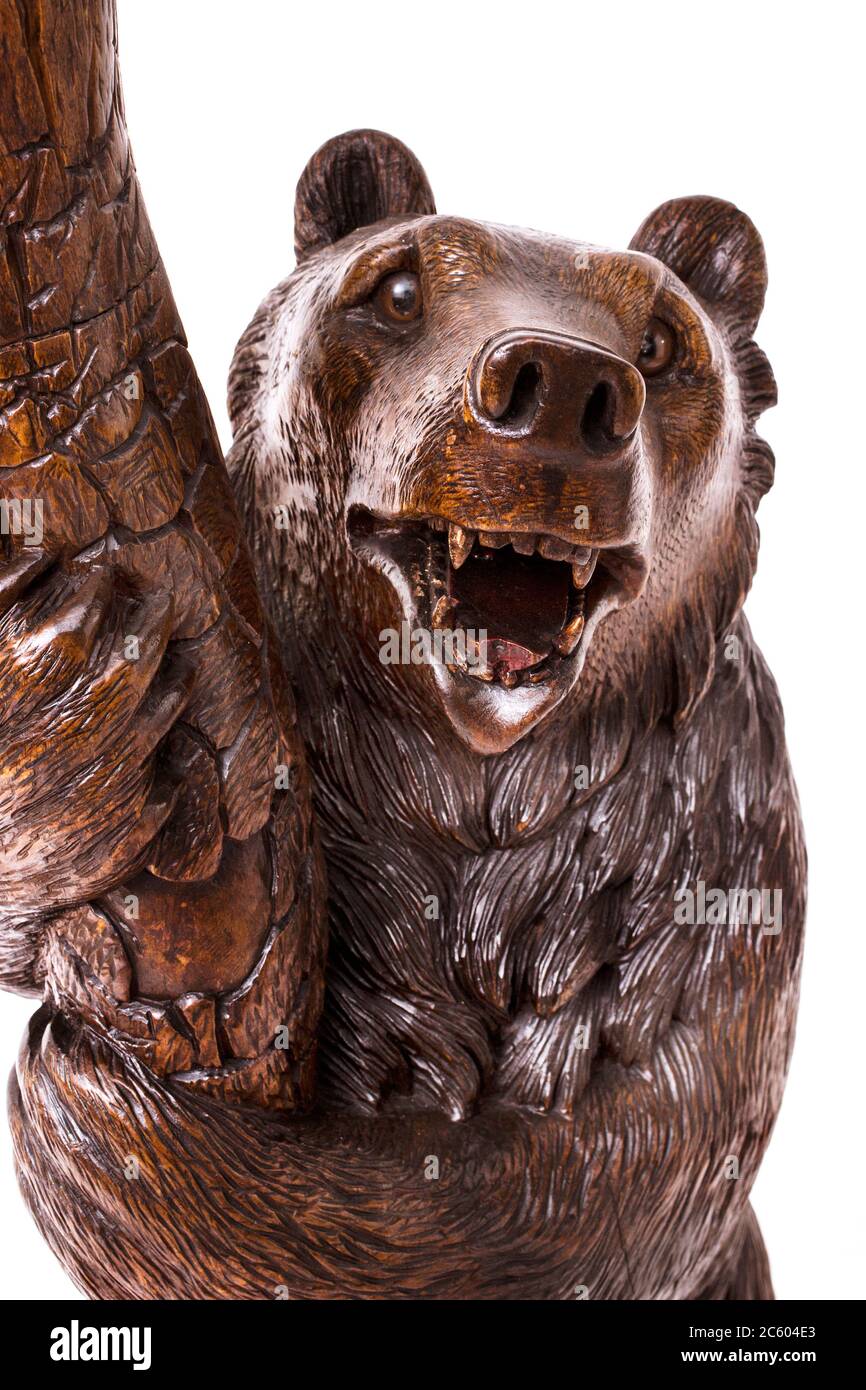 Part of the antique coat rack carving in form of tree and two bears Stock Photo