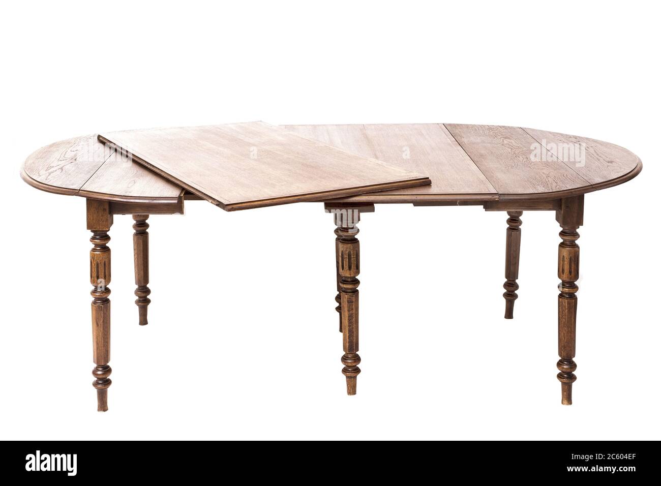 Antique oval extension kitchen table on the white background Stock
