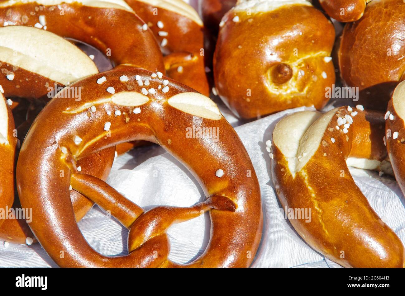 German pretzels and the like displayed in the window of a bread shop. Stock Photo