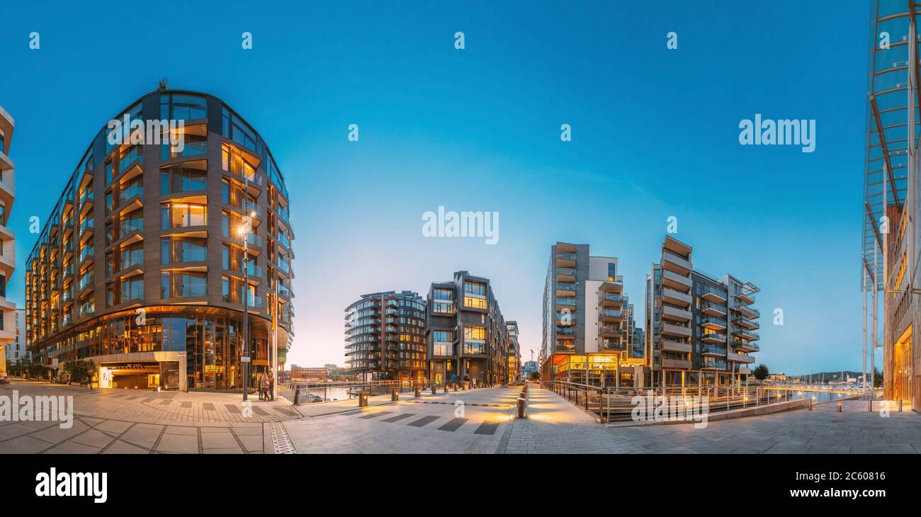 Oslo, Norway. Night View Of Residential Multi-storey Houses In Aker Brygge District. Summer Evening. Residential Area. Famous And Popular Place. Stock Photo