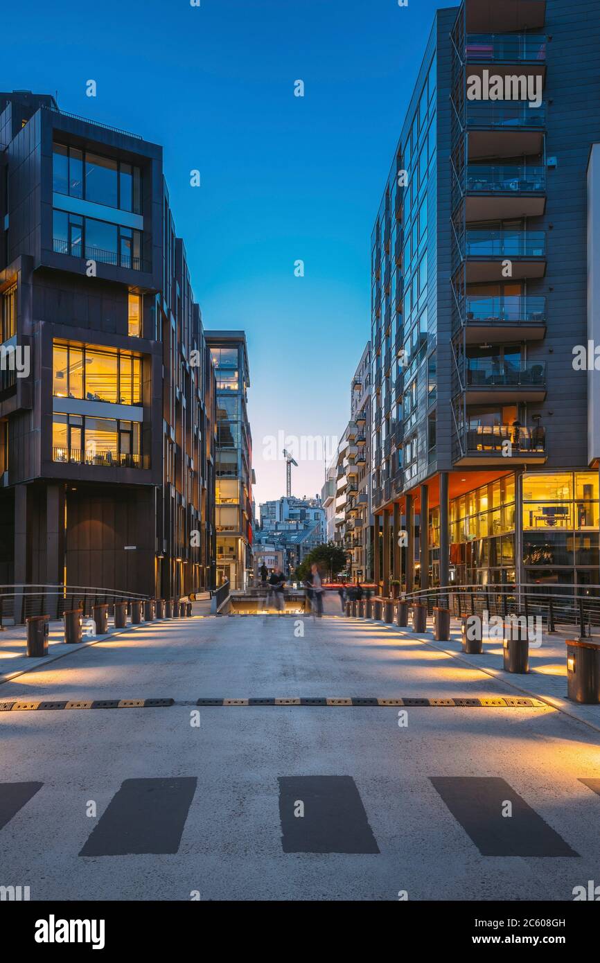 Oslo, Norway. Night View Of Residential Multi-storey Houses In Aker Brygge District. Summer Evening. Residential Area. Famous And Popular Place. Stock Photo