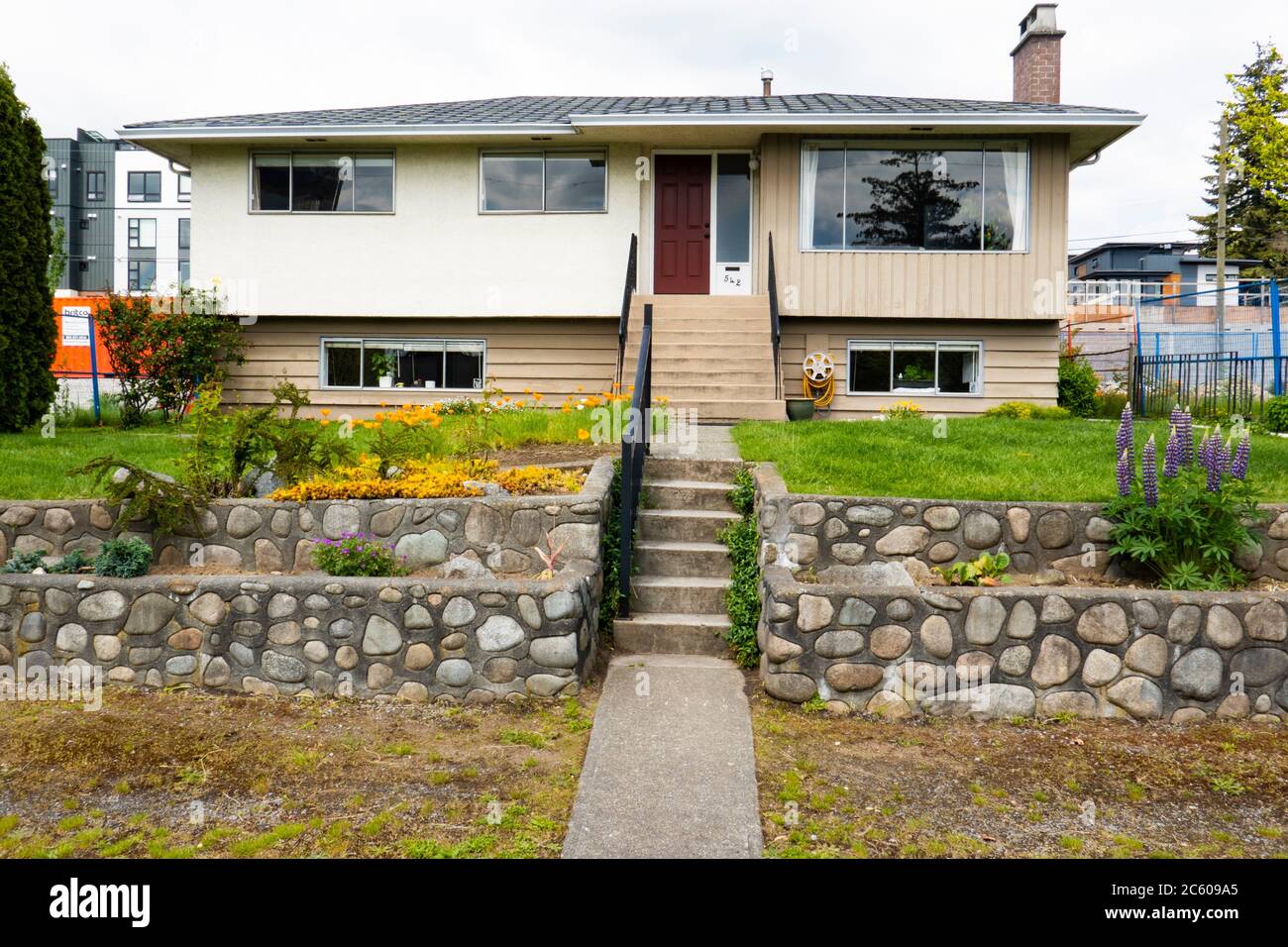 1950s house in Vancouver, BC, Canada, near new apartment buildings