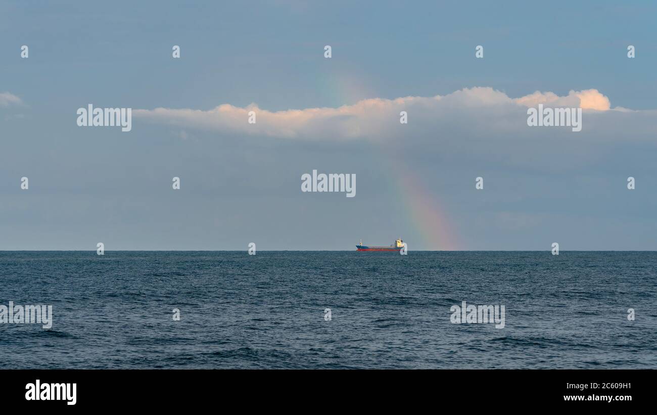 Blue sky with clouds on horizon and rainbow background hi-res stock ...