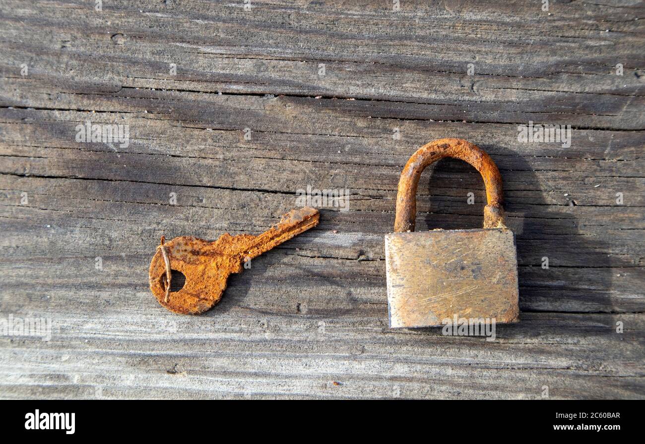little old rusty padlock with key Stock Photo