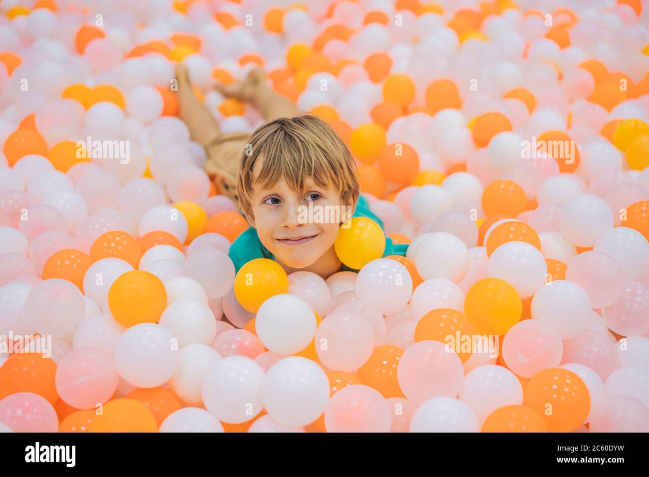 Baby boy ball pit hires stock photography and images Alamy