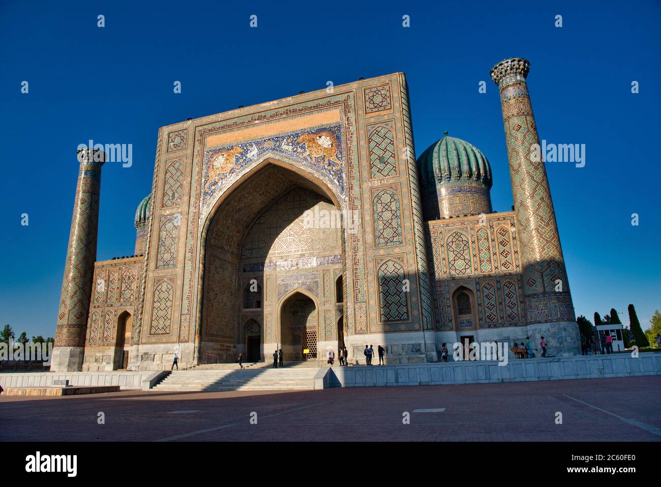 Registan Place Uzbekistan Silk Road Samarkand Listed As World Heritage By Unesco Walking People In Front Of The Sher Dor Madrasah Stock Photo Alamy