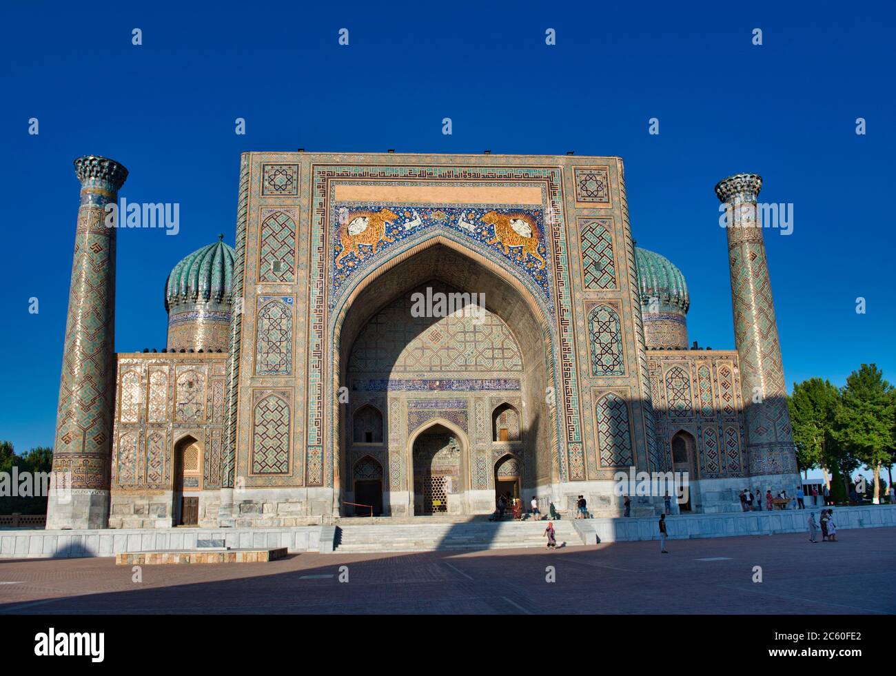 Uzbekistan Silk Road Samarkand Listed As World Heritage By Unesco Registan Place Walking People In Front Of The Sher Dor Madrasah Stock Photo Alamy