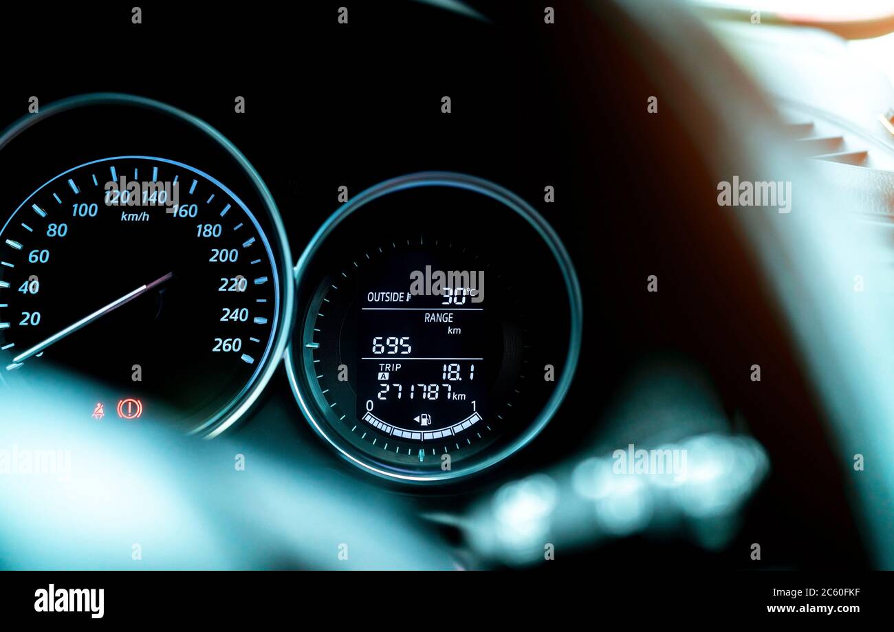Closeup car fuel gauge dashboard panel. Gasoline indicator meter and speedometer. Fuel gauge show full gas tank. Data information dashboard show Stock Photo