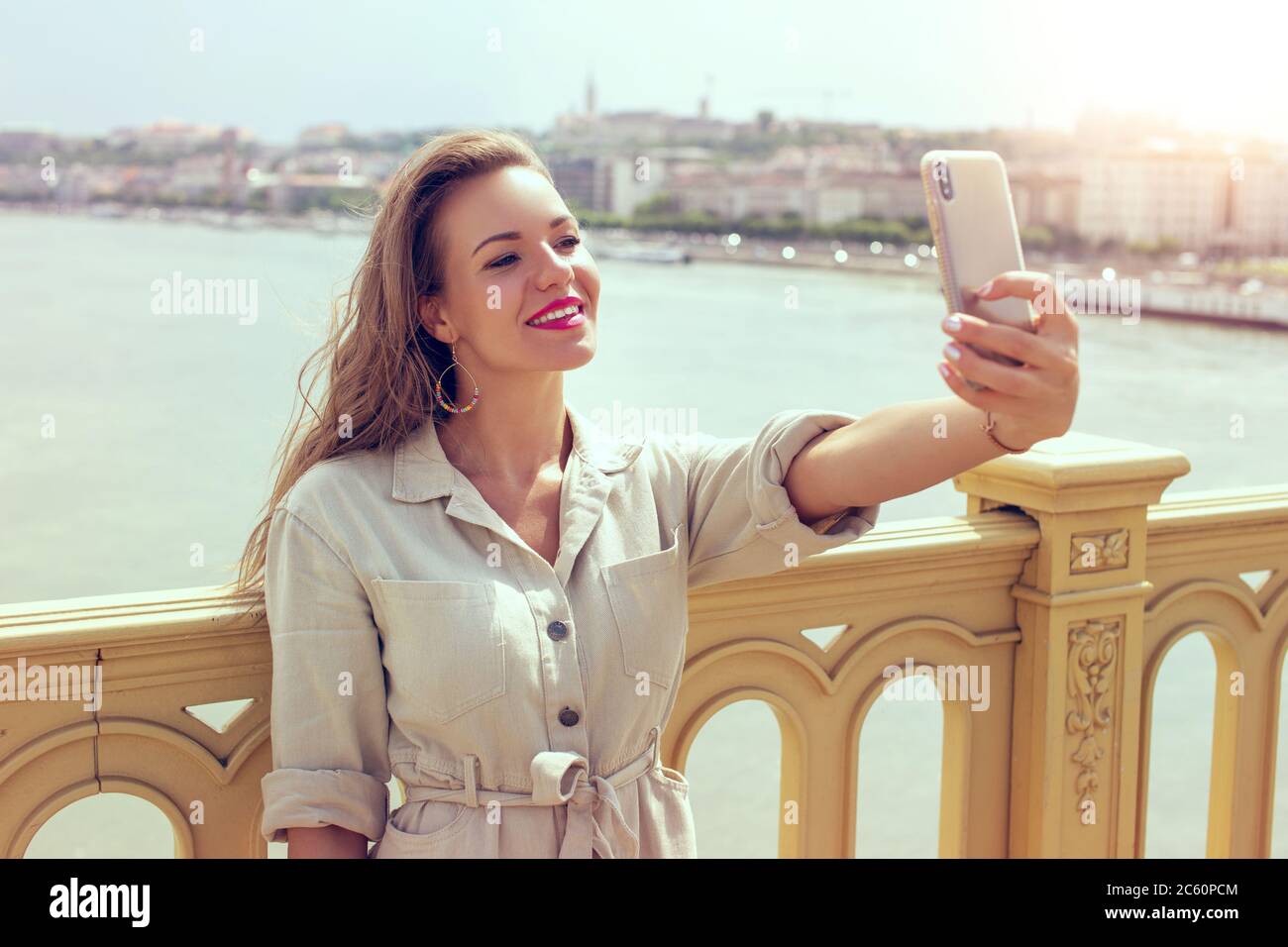 smiling-beautiful-brunette-taking-selfie-hi-res-stock-photography-and