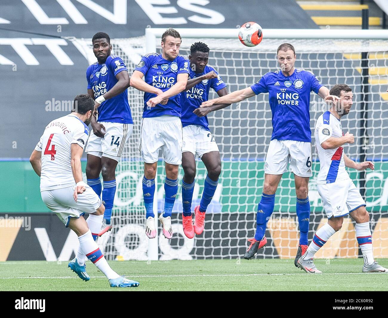 Leicester England July 04 Luka Milivojevic Of Crystal Palace Strikes A Free Kick Over The Leicester City Wall During The Premier League Match Between Leicester City And Crystal Palace At The Leicester England July 04 Luka Milivojevic Of Crystal Palace Strikes A Free Kick Over The Leicester City Wall During The Premier League Match Between Leicester City And Crystal Palace At The
