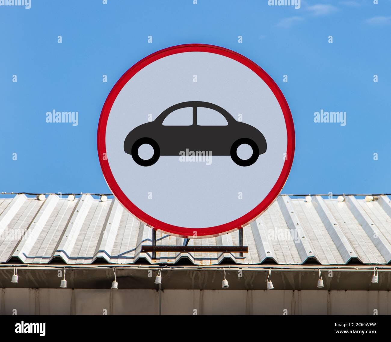 A Circle billboard with icon shows car, is installed on a roof. Offer
