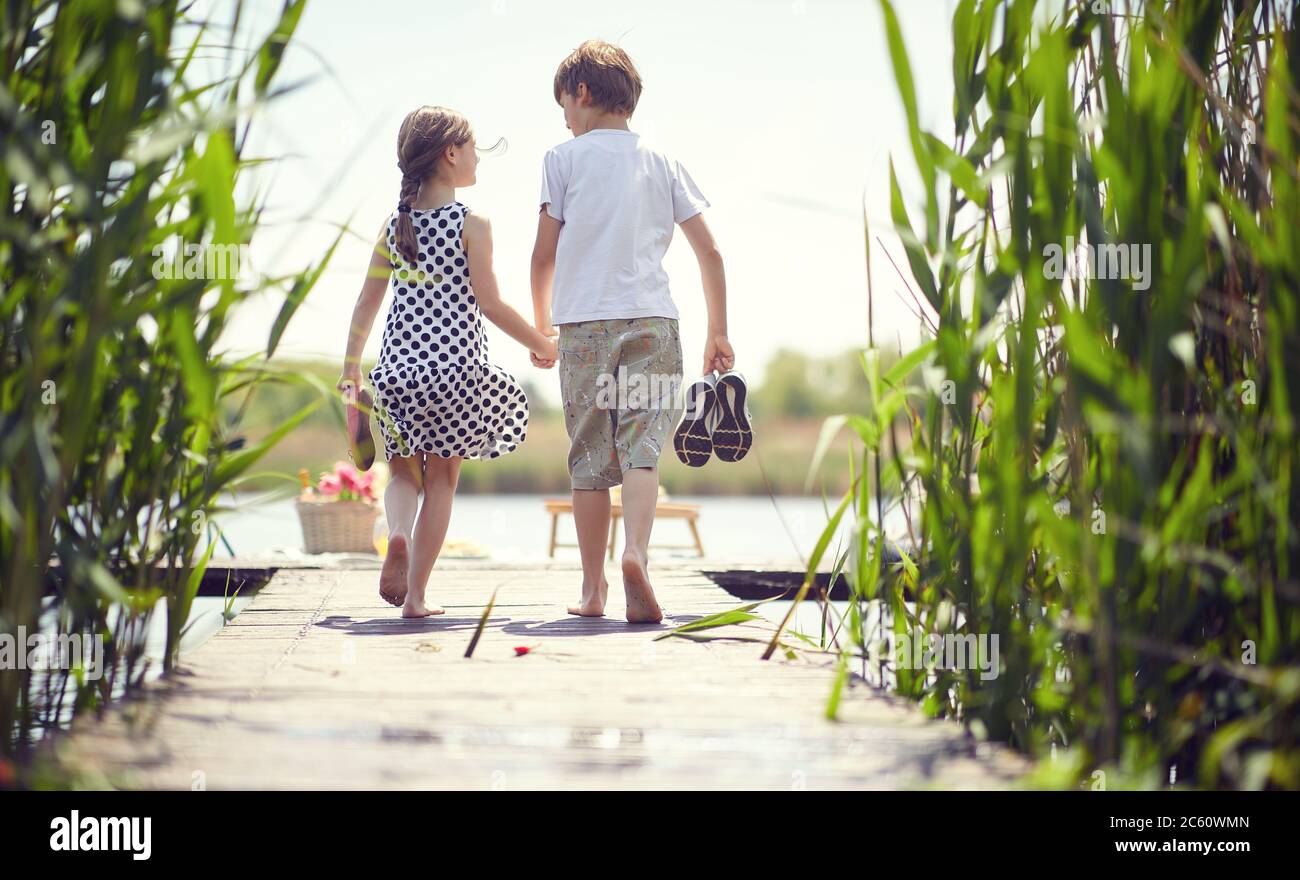 Young girl little boy enjoy hires stock photography and images Alamy