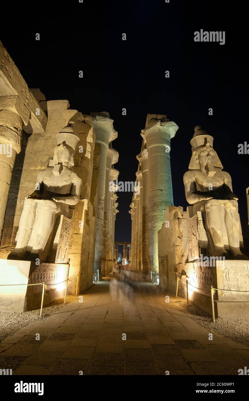 Large statues of Ramses II with columns in hypostyle hall at ancient ...