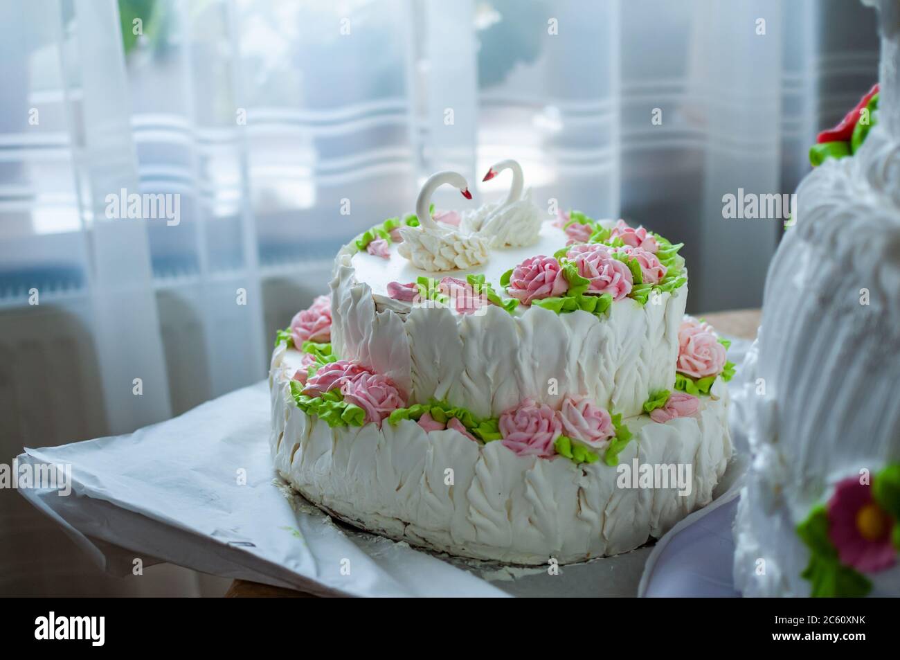 Wedding cake decorated with flowers Stock Photo - Alamy
