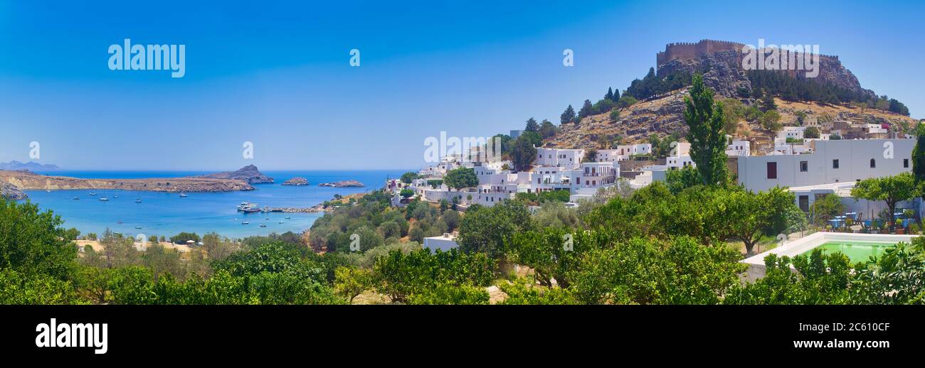 Greece trip in summer, panorama of Lindos city of Rhodes island, beautiful architecture of the city. Stock Photo