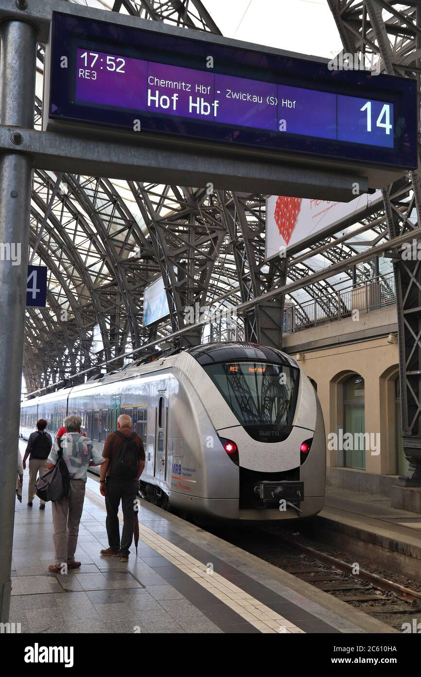 DRESDEN, GERMANY MAY 10, 2018 People wait for a train at Dresden