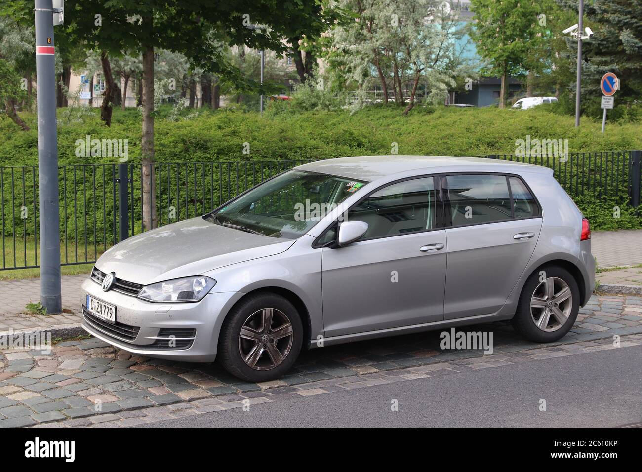DRESDEN, GERMANY - MAY 10, 2018: Silver Volkswagen Golf compact car parked in Germany. There were 45.8 million cars registered in Germany (as of 2017) Stock Photo