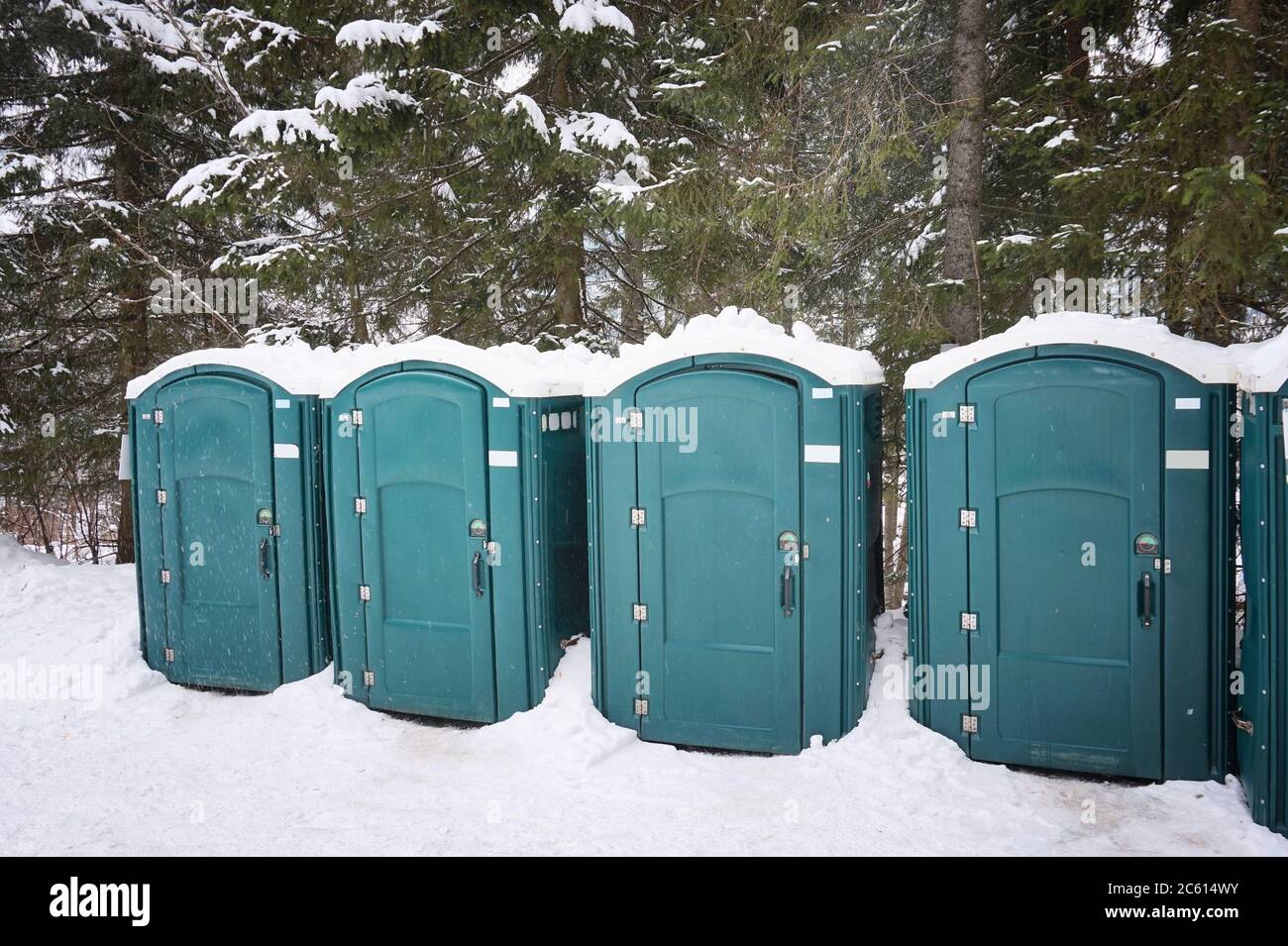 Portable toilets next to a tourist trail in Tatra National Park in Poland. Stock Photo