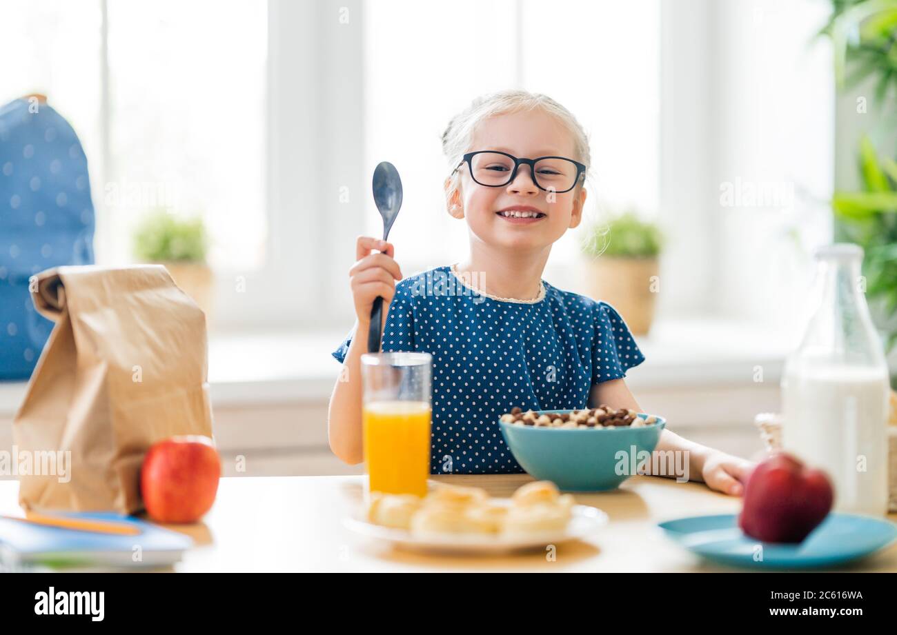 group of kids eating cereal