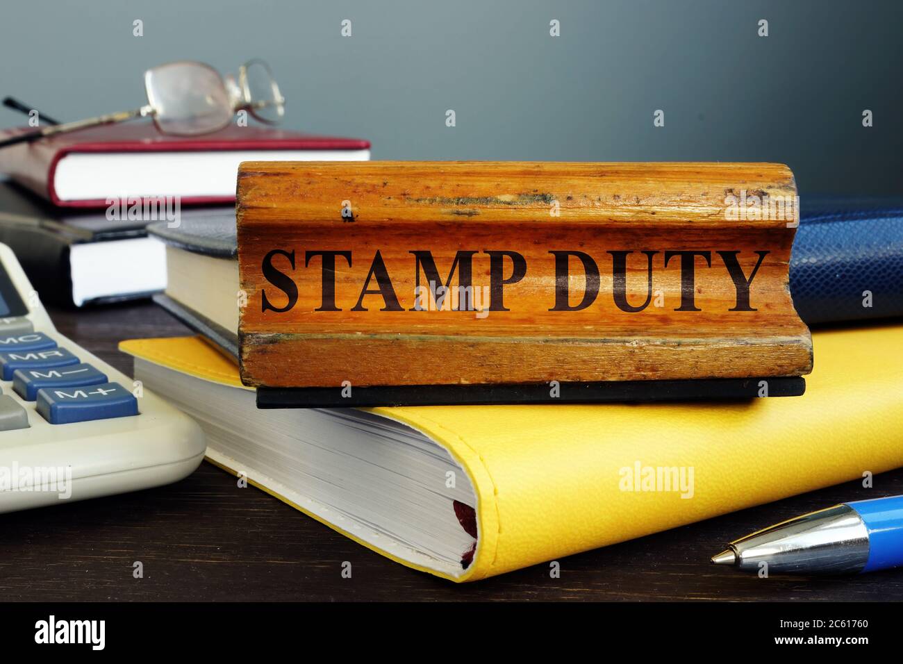 Stamp duty sign and office supply with business papers. Stock Photo