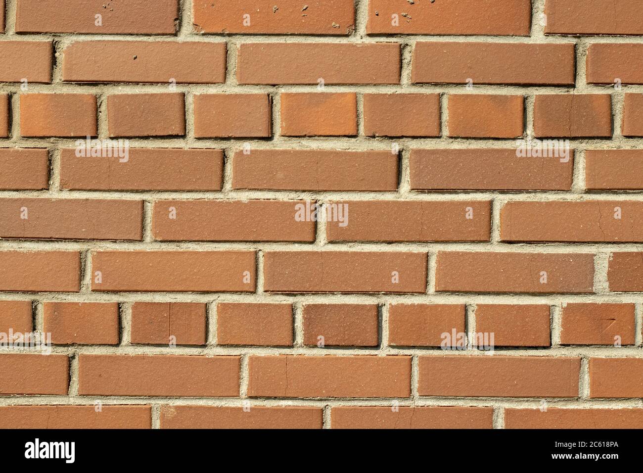 Orange wall brick background. Textured bricks. Copy space Stock Photo