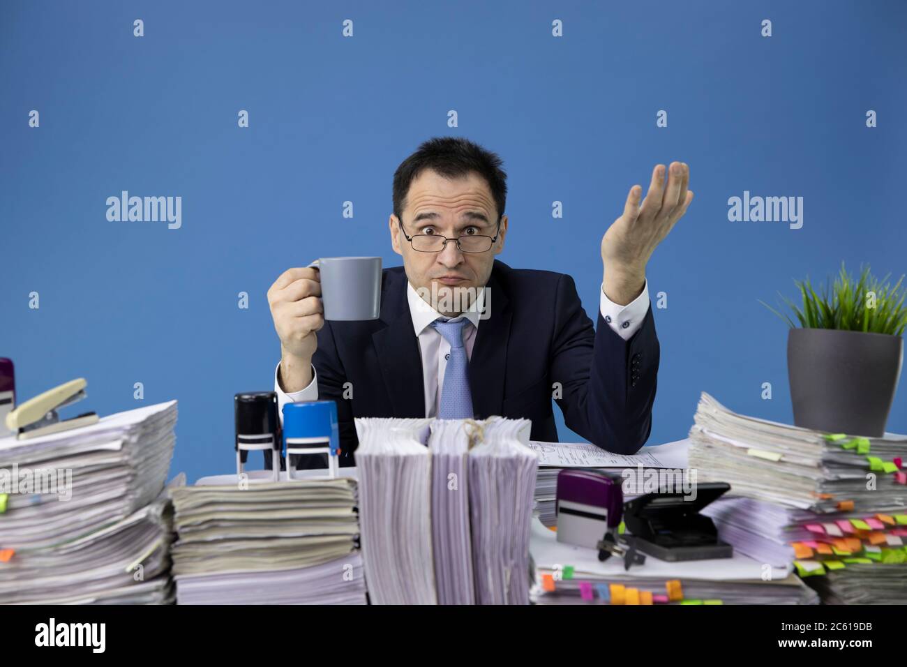 Overworked Man Pile Of Papers High Resolution Stock Photography And Images Alamy