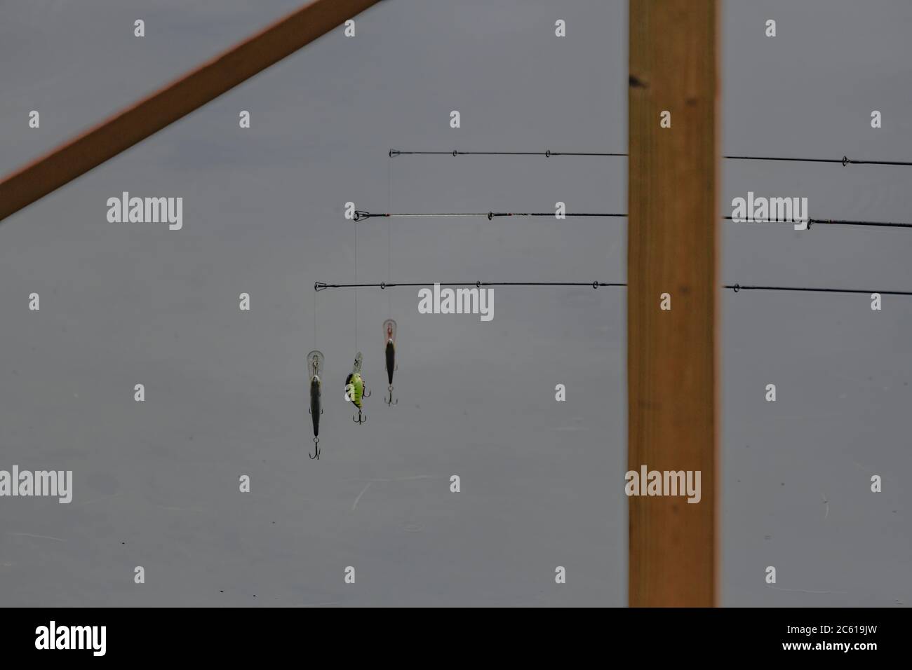 Fishing gear on a dock in Sunapee NH fishing lures for predatory fish