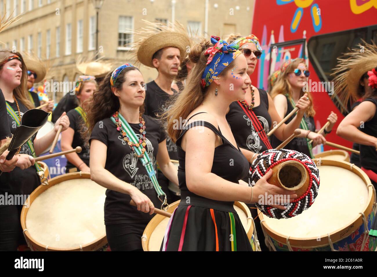 Percussion group perform in carnival costume in Bath Carnival, Bath, Somerset, England. The photo was taken on 16th of July, 2016. Stock Photo