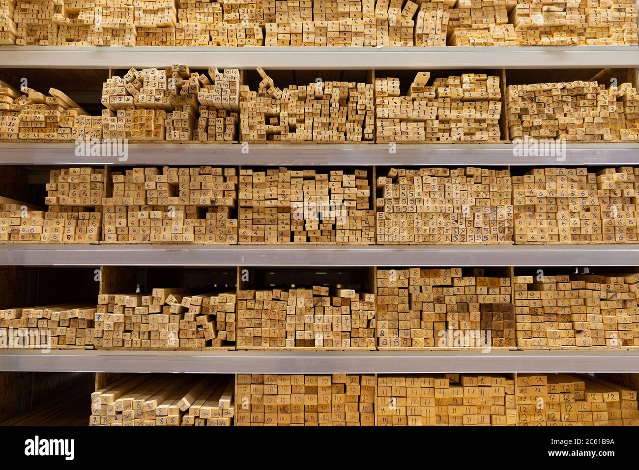 hardware store shelving with large wooden boards Stock Photo Alamy