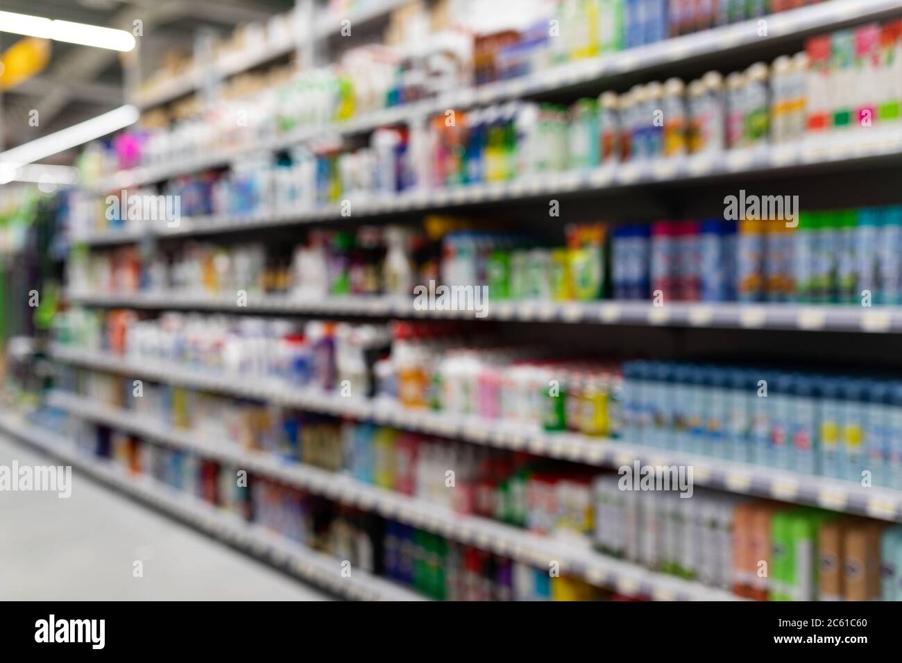 MINSK, BELARUS - April 01, 2020: Blurred background of hardware store with cleaning products, including cleaning products Stock Photo